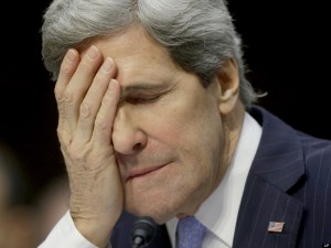 Senate Foreign Relations Chairman Sen. John Kerry, D-Mass., rubs his faces as he listens to Sen. John McCain, R-Ariz., speak during his confirmation hearing to become the next top diplomat, replacing Secretary of State Hillary Rodham Clinton, Thursday, Jan. 24, 2013, on Capitol Hill in Washington. Kerry is likely to face friendly questioning on a smooth path to approval before the committee he has served on for 28 years and led for the past four.  (AP Photo/Pablo Martinez Monsivais)
