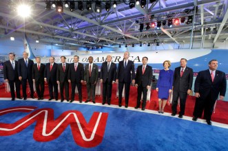 Republican presidential candidates, from left, former Pennsylvania Sen. Rick Santorum, former New York Gov. George Pataki, Sen. Rand Paul, R-Ky., former Arkansas Gov. Mike Huckabee, Sen. Marco Rubio, R-Fla., Sen. Ted Cruz, R-Texas, retired neurosurgeon Ben Carson, businessman Donald Trump, former Florida Gov. Jeb Bush, Wisconsin Gov. Scott Walker, businesswoman Carly Fiorina, Ohio Gov. John Kasich, and New Jersey Gov. Chris Christie take the stage during the CNN Republican presidential debate at the Ronald Reagan Presidential Library and Museum on Wednesday, Sept. 16, 2015, in Simi Valley, Calif. (AP Photo/Chris Carlson)